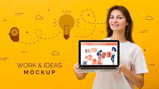 Female holding laptop