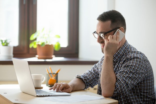 Man speaking into his phone